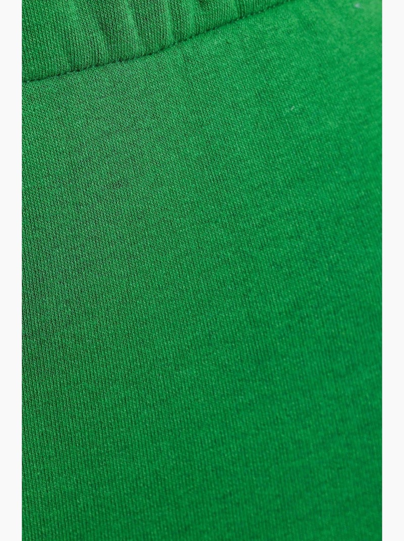 Pantalones deportivos de cintura alta con abertura y cremallera hiccup Verde - Kiabi