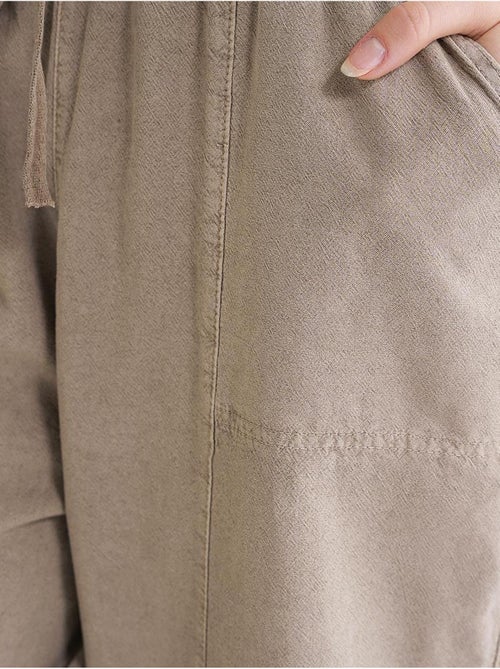 Pantalones deportivos de mezcla de lino con cintura con cordón mixray - Kiabi Pantalones deportivos de mezcla de lino con cintura con cordón mixray - Kiabi