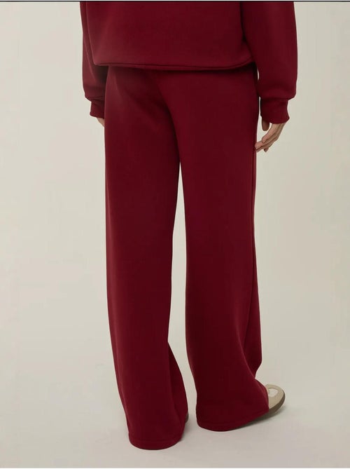 Pantalones deportivos de pierna ancha con cintura y cordón ajustable hiccup - Kiabi Pantalones deportivos de pierna ancha con cintura y cordón ajustable hiccup - Kiabi