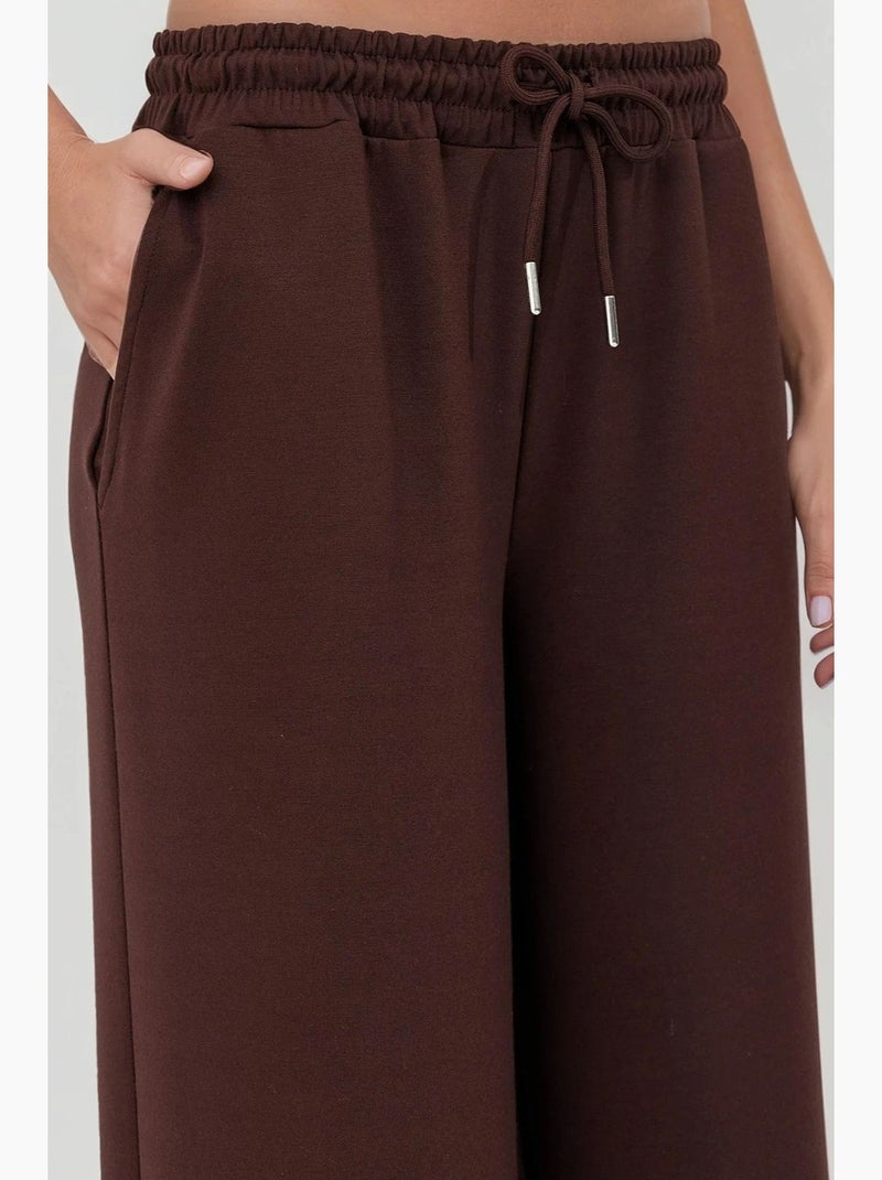 Pantalones deportivos de pierna ancha de modal suave al tacto hiccup Marrón chocolate - Kiabi