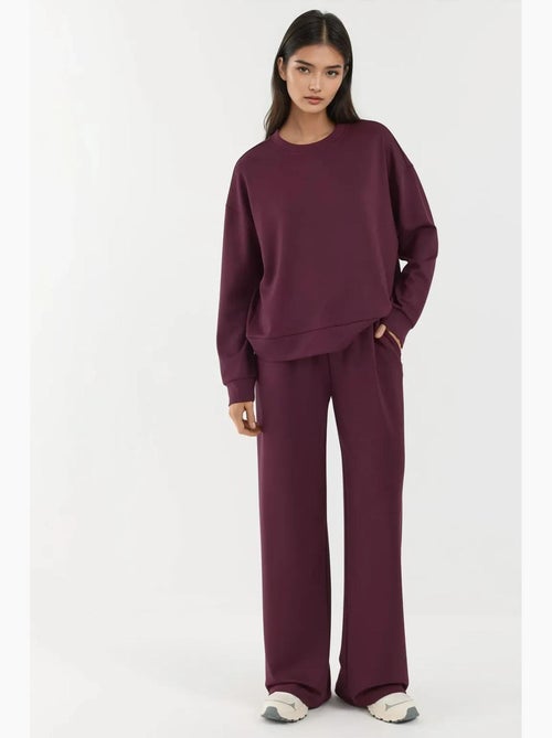 Pantalones deportivos de pierna ancha de modal suave al tacto hiccup - Kiabi Pantalones deportivos de pierna ancha de modal suave al tacto hiccup - Kiabi