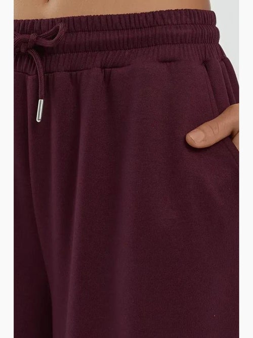 Pantalones deportivos de pierna ancha de modal suave al tacto hiccup - Kiabi Pantalones deportivos de pierna ancha de modal suave al tacto hiccup - Kiabi