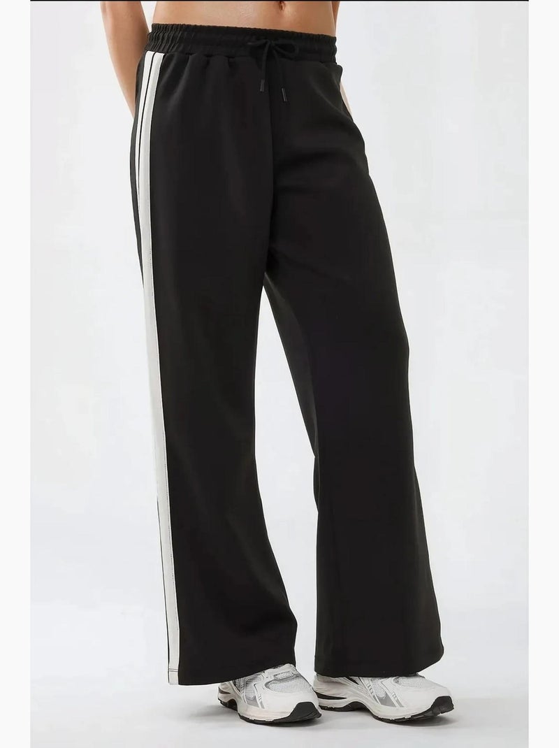Pantalones deportivos de rayas y pierna ancha hiccup Negro - Kiabi