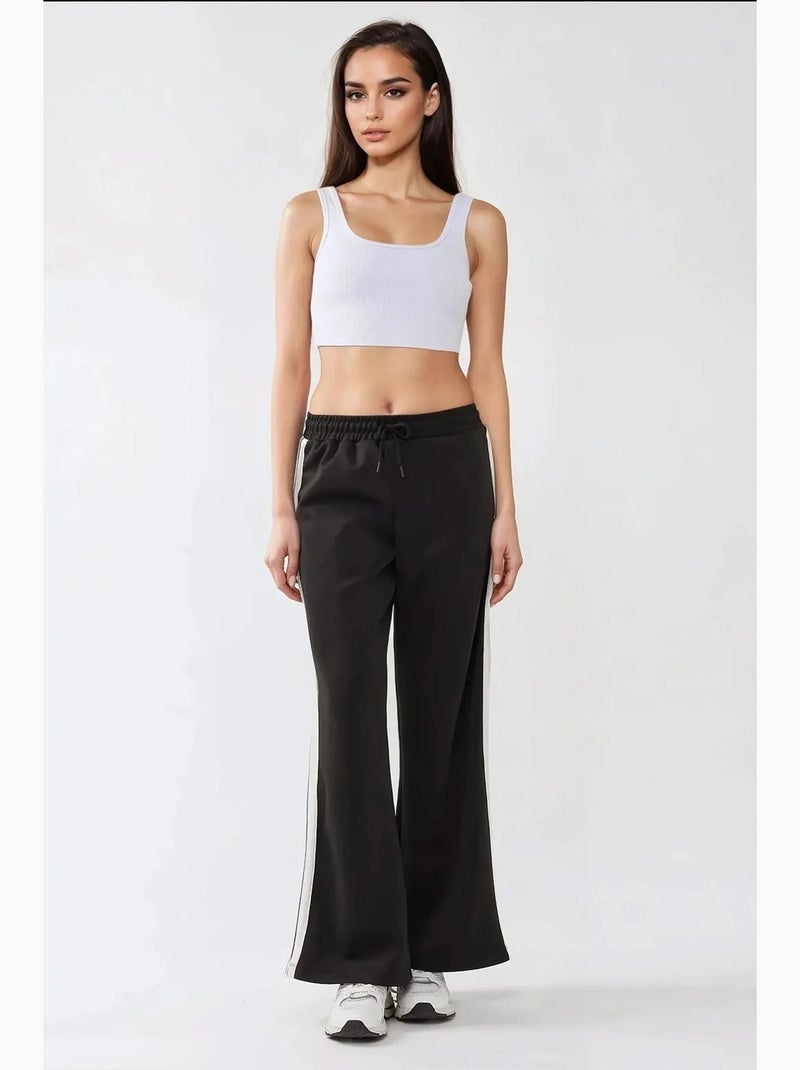 Pantalones deportivos de rayas y pierna ancha hiccup Negro - Kiabi