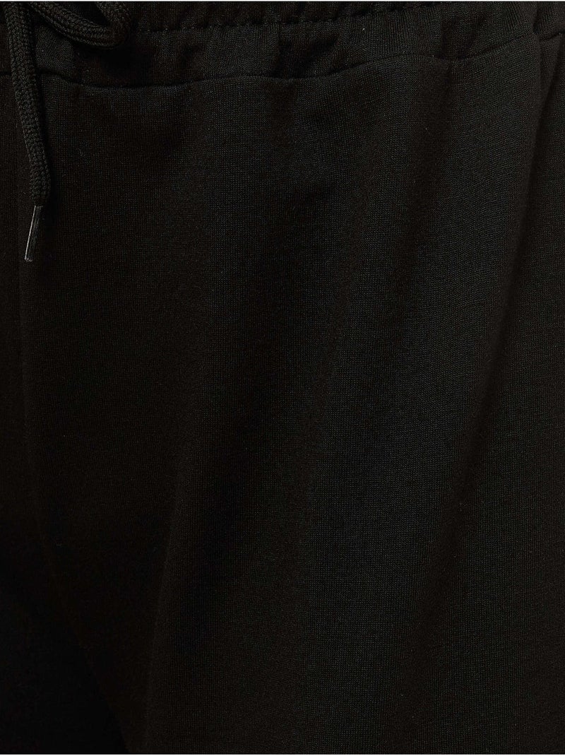 Pantalones deportivos elásticos de pierna ancha hiccup Negro - Kiabi