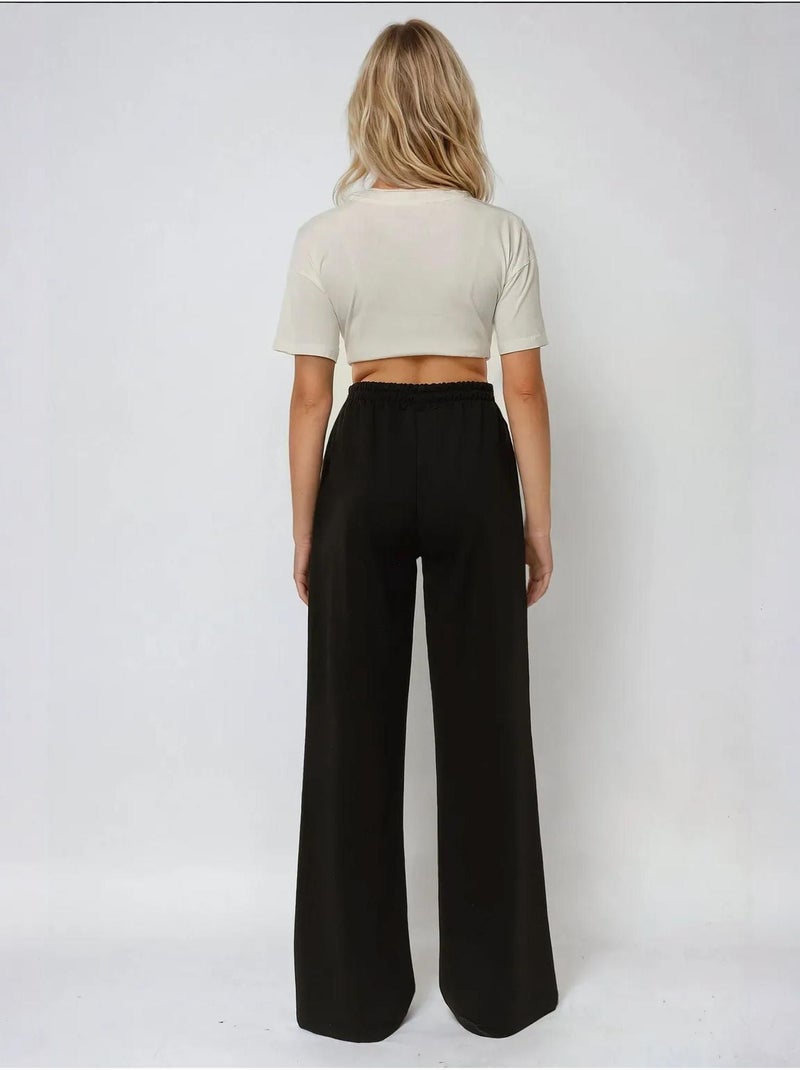 Pantalones deportivos elásticos de pierna ancha hiccup Negro - Kiabi