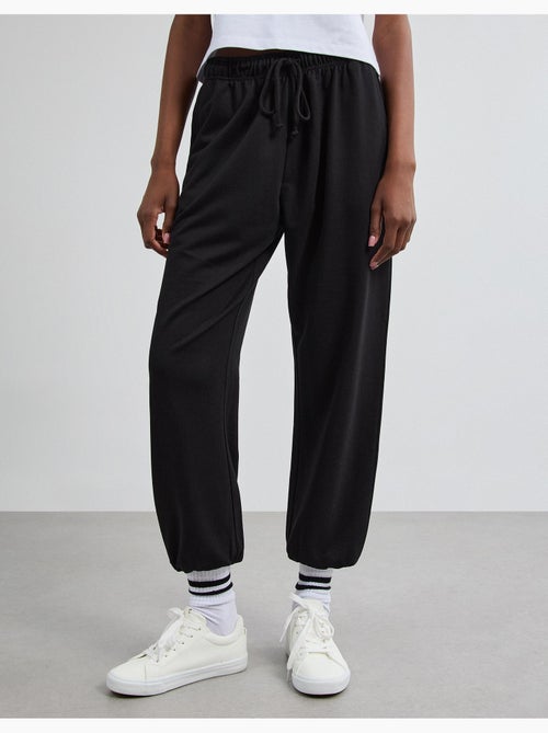 Pantalones deportivos hechos de mullido, mo fashion - Kiabi Pantalones deportivos hechos de mullido, mo fashion - Kiabi