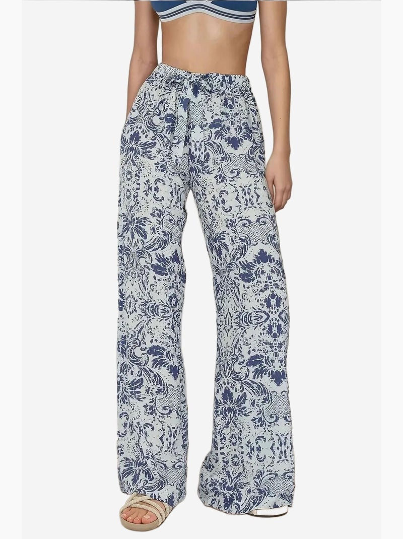 Pantalones estampados de cintura elástica y pierna ancha hiccup Blanco - Kiabi