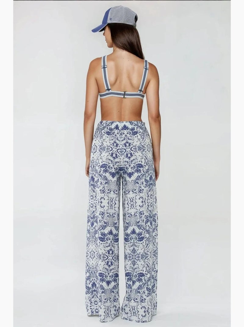 Pantalones estampados de cintura elástica y pierna ancha hiccup Blanco - Kiabi