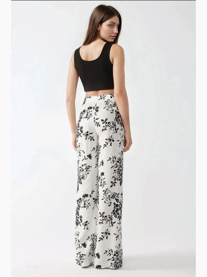 Pantalones estampados de pierna ancha hiccup Multicolor - Kiabi