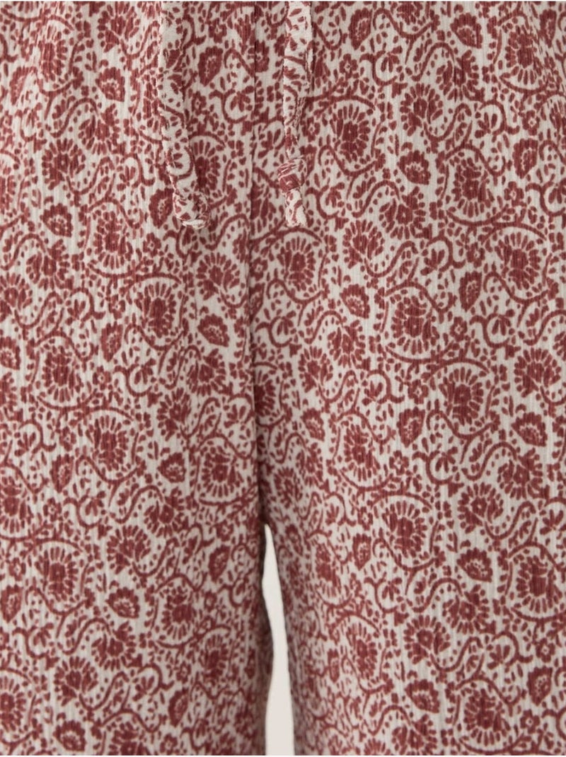 Pantalones holgados con estampado de pierna ancha hiccup Rosa viejo - Kiabi