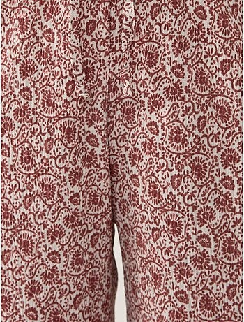 Pantalones holgados con estampado de pierna ancha