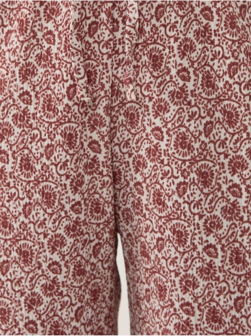 Pantalones holgados con estampado de pierna ancha - Kiabi Pantalones holgados con estampado de pierna ancha - Kiabi
