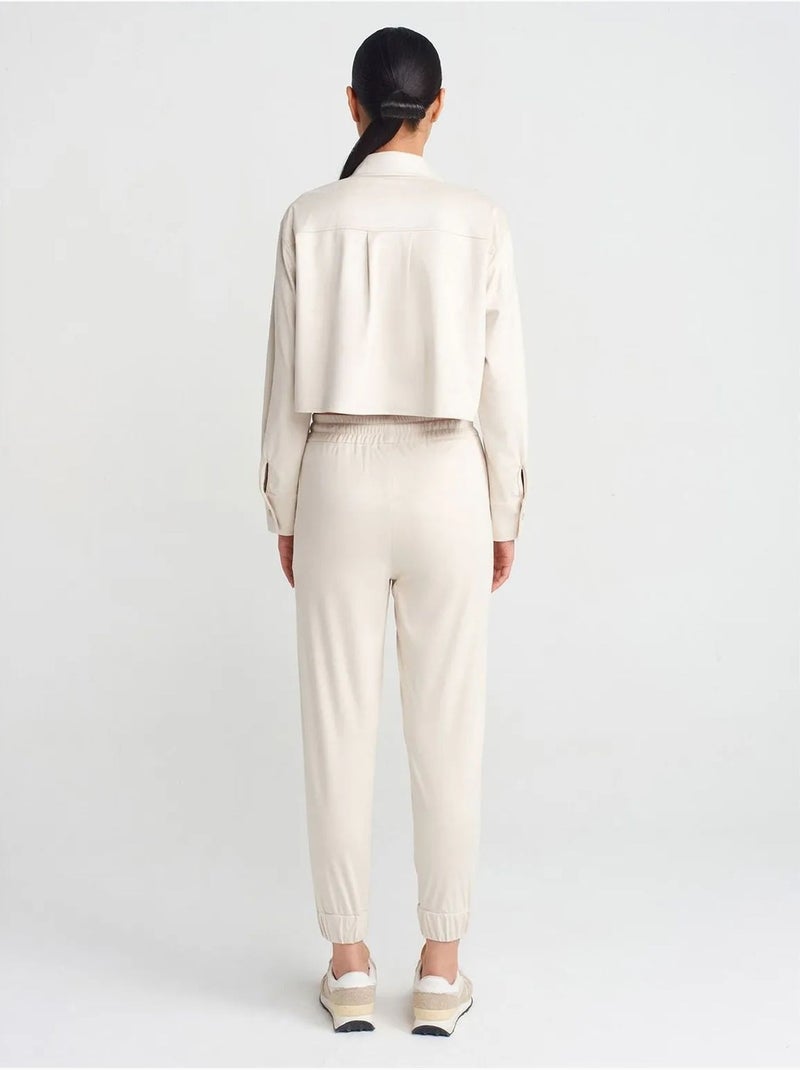 Pantalones jogger de ante sintético Crema - Kiabi