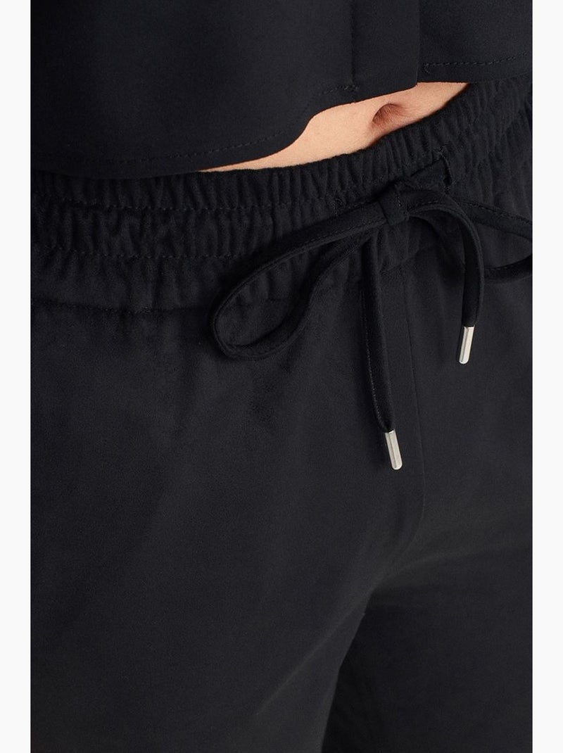 Pantalones jogger de ante sintético dilvin Negro - Kiabi