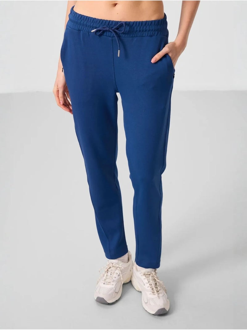 Pantalones jogger de mujer con cremallera tommy Azul laguna - Kiabi