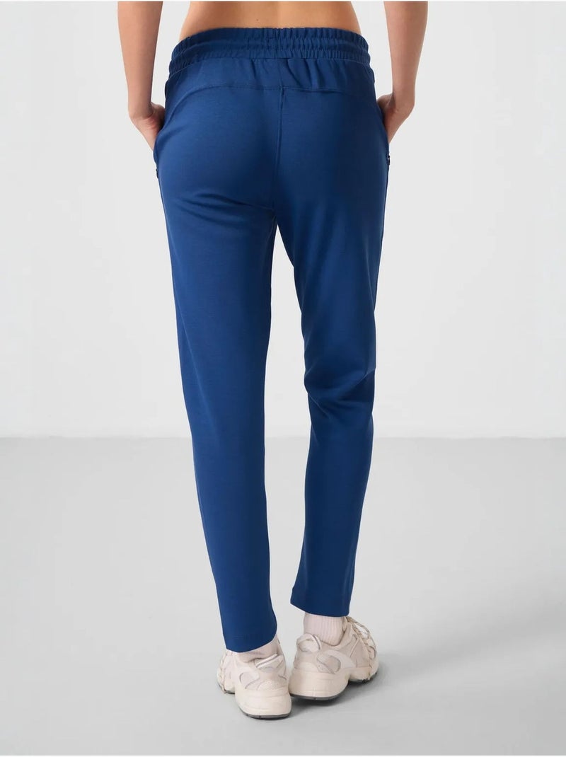 Pantalones jogger de mujer con cremallera tommy Azul laguna - Kiabi