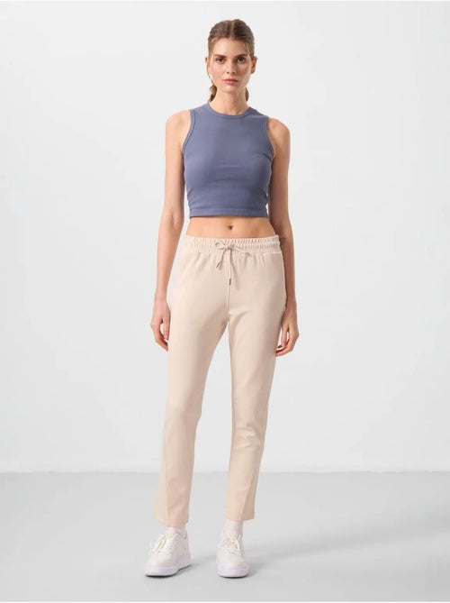 Pantalones jogger de mujer con cremallera tommy - Kiabi Pantalones jogger de mujer con cremallera tommy - Kiabi