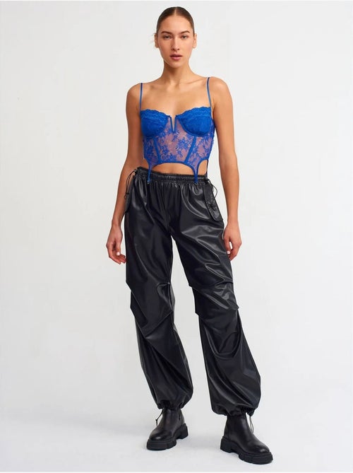 Pantalones jogger de mujer de piel sintética dilvin - Kiabi Pantalones jogger de mujer de piel sintética dilvin - Kiabi