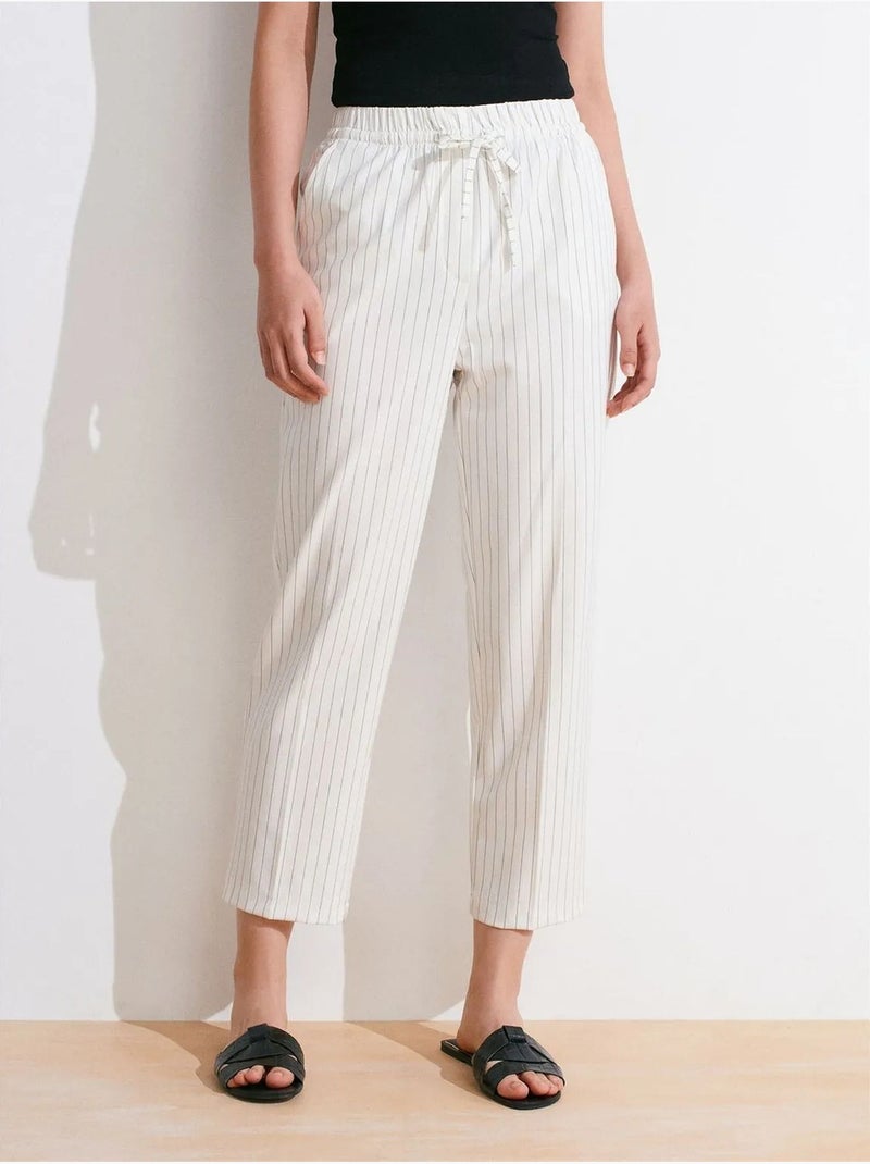 Pantalones jogger de tejido a rayas de pernera recta dilvin Blanco roto - Kiabi