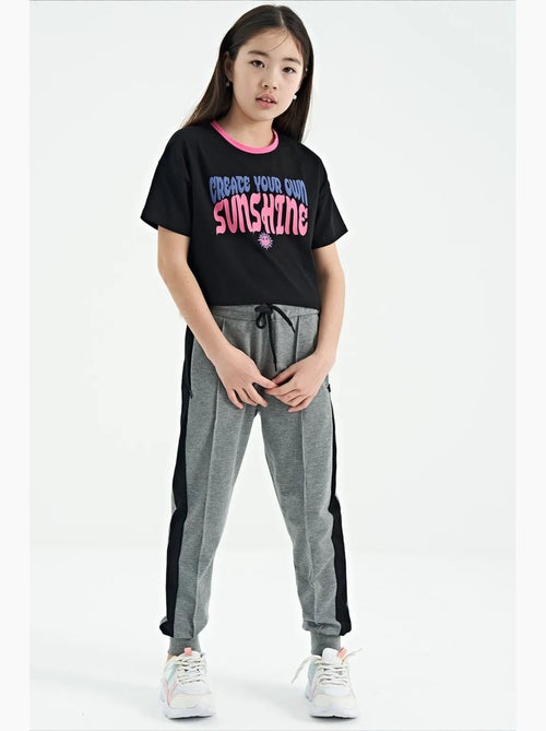 Pantalones juveniles unisex de mezcla de algodón tommy - Kiabi Pantalones juveniles unisex de mezcla de algodón tommy - Kiabi