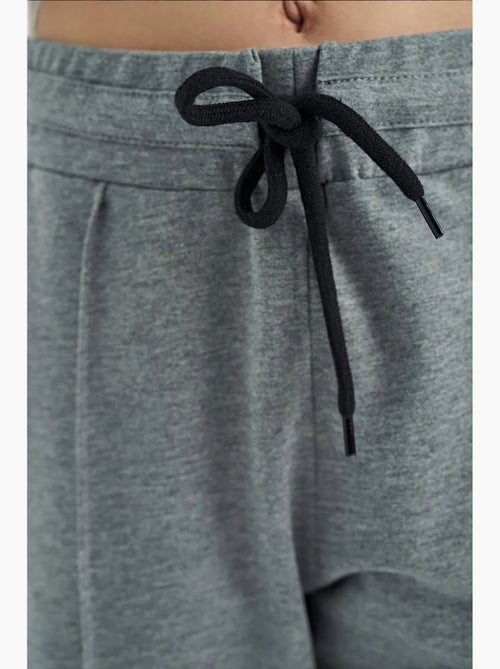 Pantalones juveniles unisex de mezcla de algodón tommy - Kiabi Pantalones juveniles unisex de mezcla de algodón tommy - Kiabi