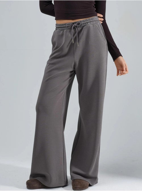 Pantalones largos con cintura elástica y cordón ajustable busem - Kiabi Pantalones largos con cintura elástica y cordón ajustable busem - Kiabi
