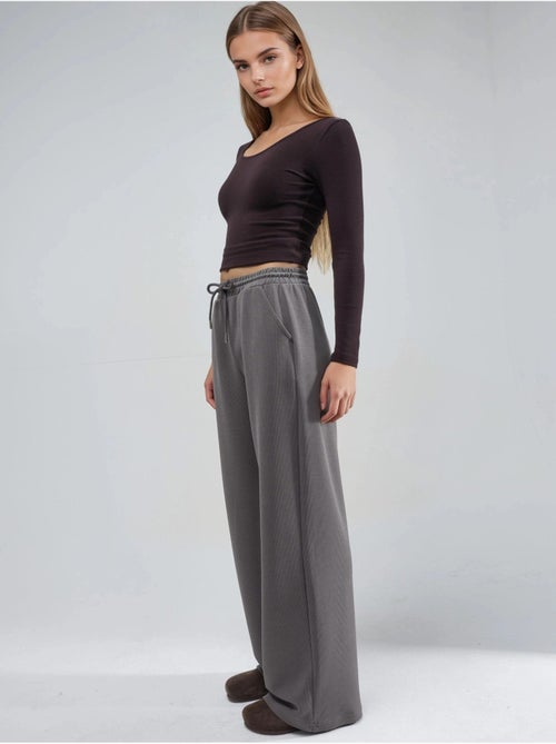 Pantalones largos con cintura elástica y cordón ajustable busem - Kiabi Pantalones largos con cintura elástica y cordón ajustable busem - Kiabi