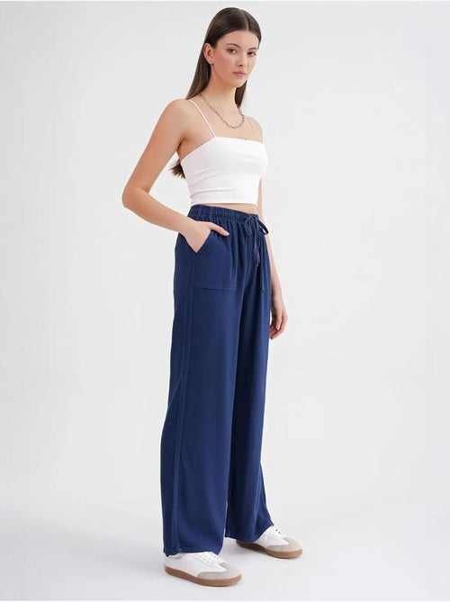 Pantalones largos de pierna recta con cintura elástica para mujer mixray - Kiabi Pantalones largos de pierna recta con cintura elástica para mujer mixray - Kiabi