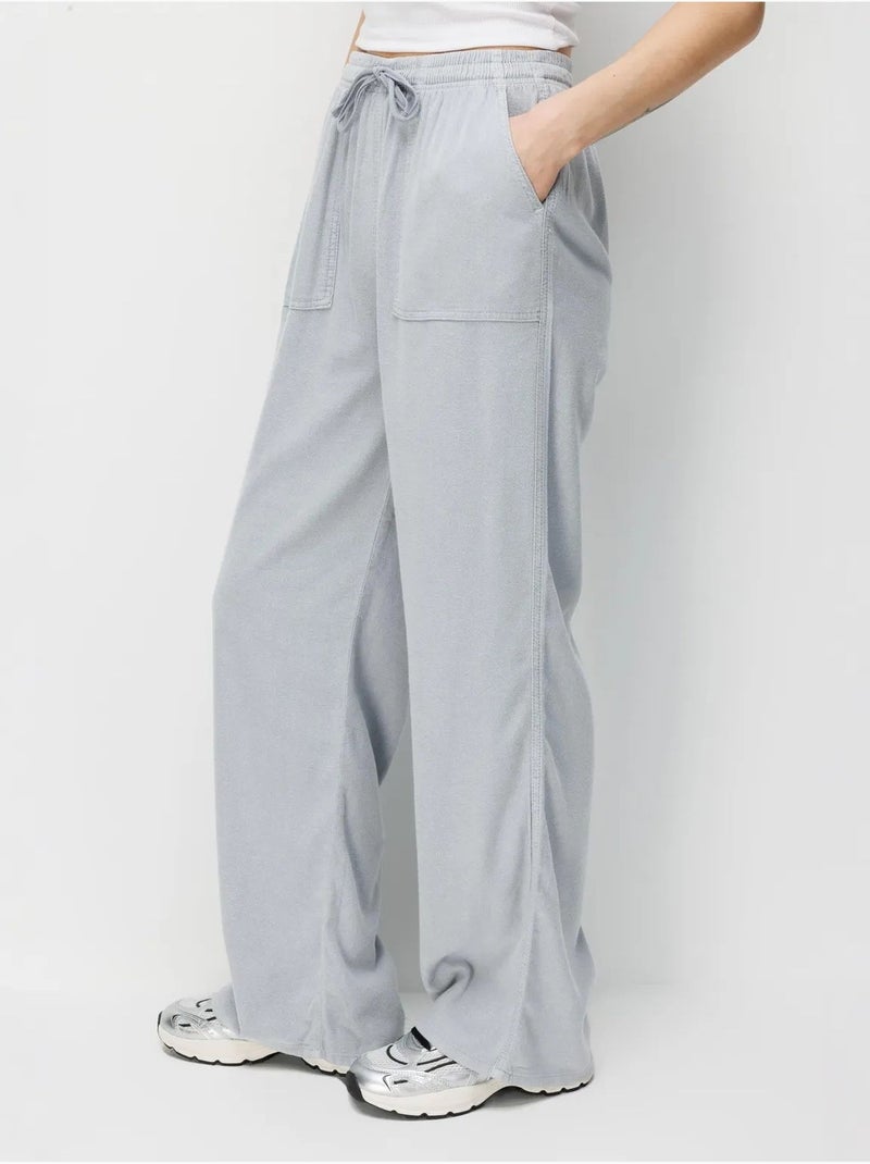 Pantalones largos de pierna recta con cintura elástica para mujer mixray Gris claro - Kiabi