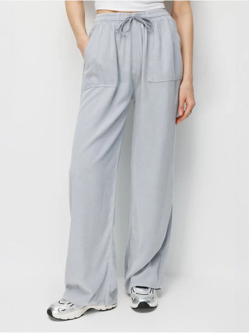 Pantalones largos de pierna recta con cintura elástica para mujer mixray Gris claro - Kiabi
