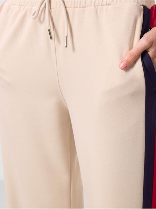 Pantalones palazzo a rayas con cintura con cordón tommy - Kiabi Pantalones palazzo a rayas con cintura con cordón tommy - Kiabi