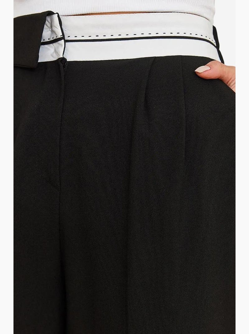 Pantalones palazzo abotonados con cintura asimétrica y pierna ancha lucci Negro - Kiabi