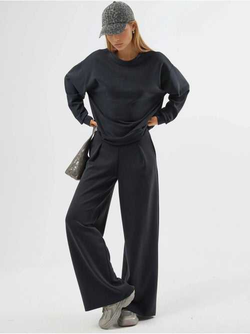 Pantalones palazzo de cintura alta con elástico busem - Kiabi Pantalones palazzo de cintura alta con elástico busem - Kiabi
