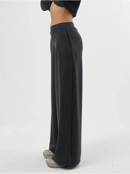 Pantalones palazzo de cintura alta con elástico busem - Kiabi Pantalones palazzo de cintura alta con elástico busem - Kiabi