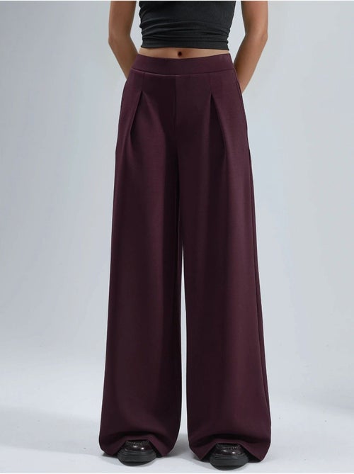 Pantalones palazzo de cintura alta con elástico busem - Kiabi Pantalones palazzo de cintura alta con elástico busem - Kiabi