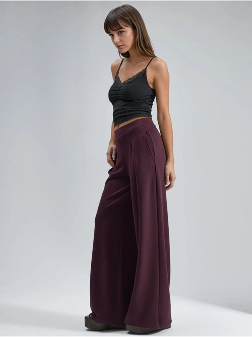 Pantalones palazzo de cintura alta con elástico busem - Kiabi Pantalones palazzo de cintura alta con elástico busem - Kiabi