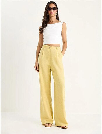 Pantalones palazzo de lino con cintura alta y detalle plisado de bianco lucci