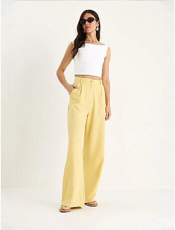 Pantalones palazzo de lino con cintura alta y detalle plisado de bianco lucci