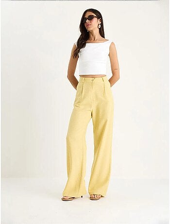 Pantalones palazzo de lino con cintura alta y detalle plisado de bianco lucci