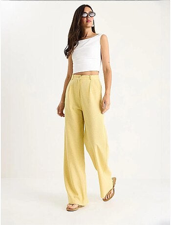 Pantalones palazzo de lino con cintura alta y detalle plisado de bianco lucci