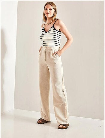 Pantalones palazzo de lino con cintura alta y detalle plisado de bianco lucci