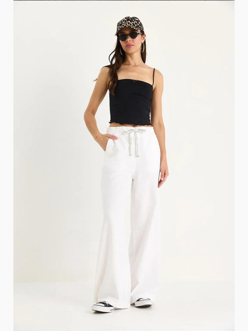 Pantalones palazzo de lino con cintura elástica y bolsillos detallados de bianco lucci Blanco - Kiabi