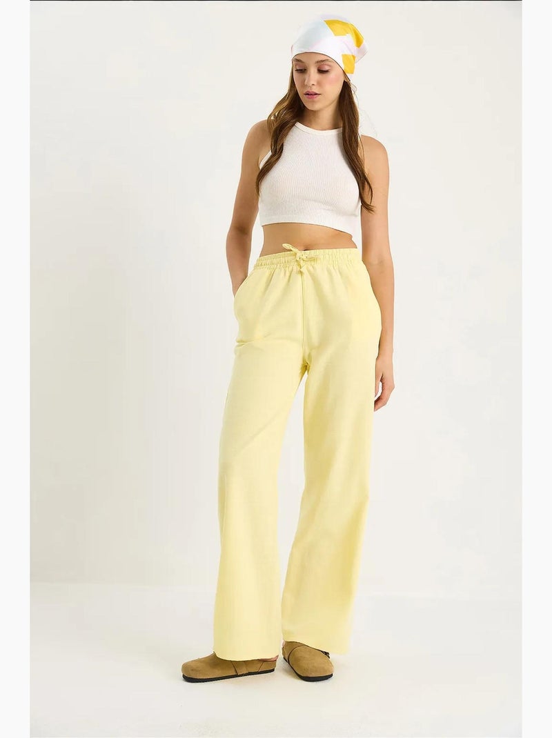 Pantalones palazzo de lino con cintura elástica y detalle de bolsillos de bianco lucci Amarillo limón - Kiabi