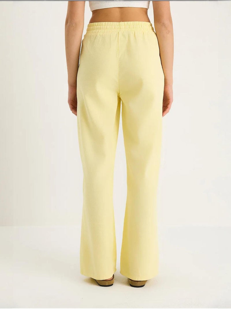 Pantalones palazzo de lino con cintura elástica y detalle de bolsillos de bianco lucci Amarillo limón - Kiabi