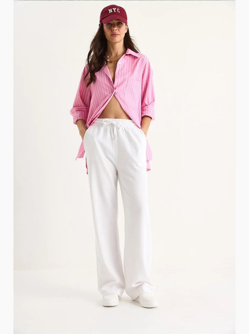 Pantalones palazzo de lino con cintura elástica y detalle de bolsillos de bianco lucci Blanco - Kiabi