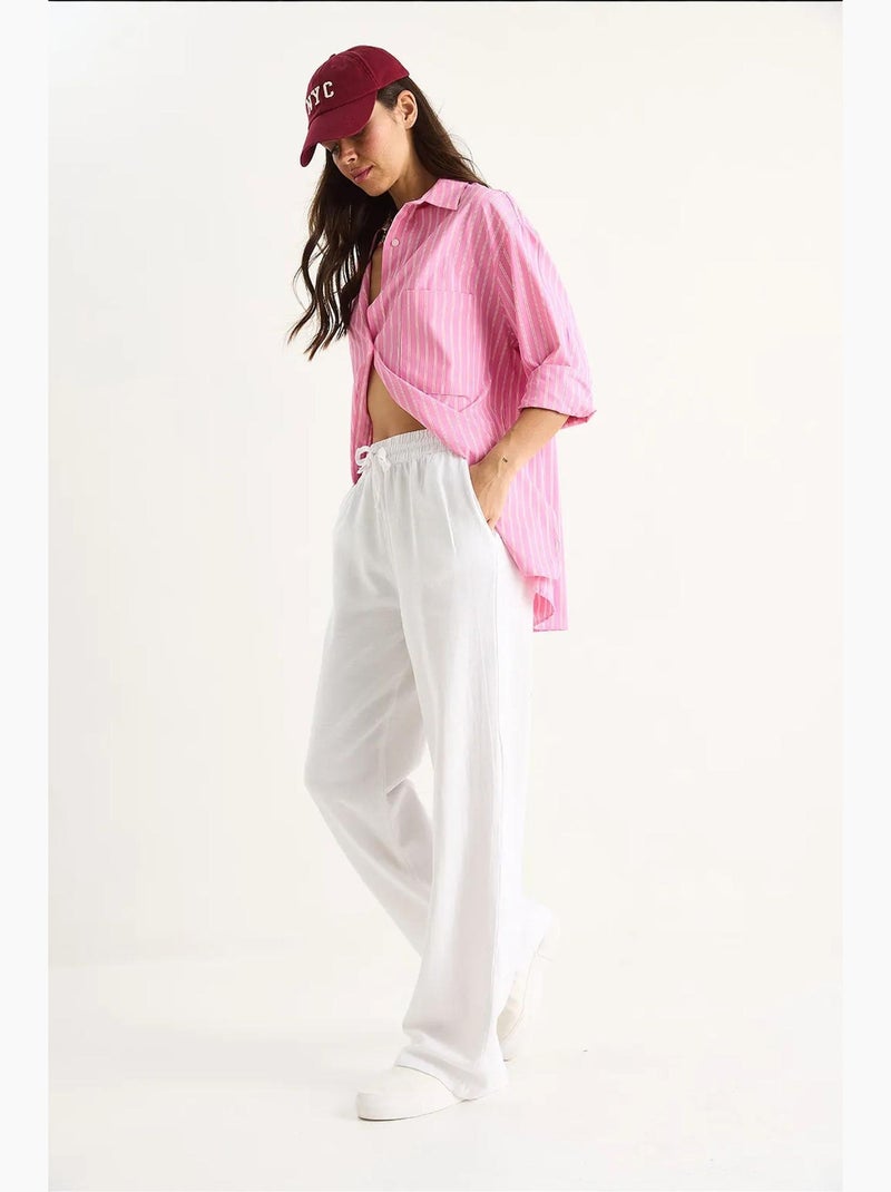 Pantalones palazzo de lino con cintura elástica y detalle de bolsillos de bianco lucci Blanco - Kiabi