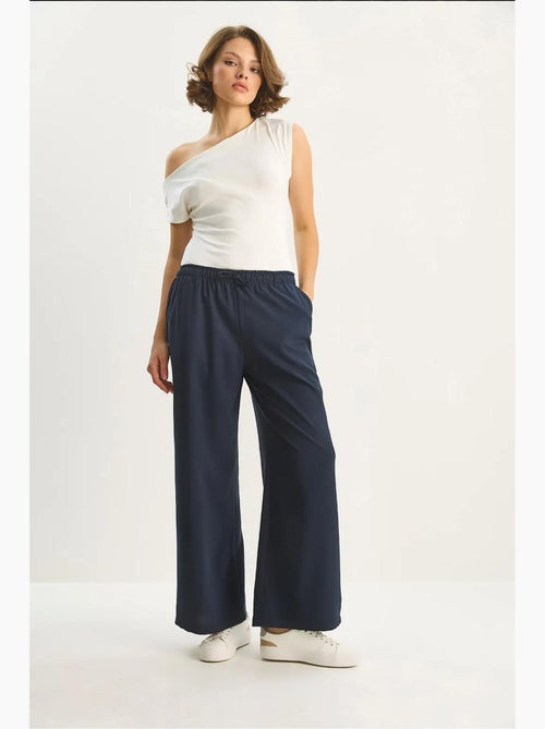 Pantalones palazzo de pierna ancha con cierre de lazo lucci - Kiabi Pantalones palazzo de pierna ancha con cierre de lazo lucci - Kiabi