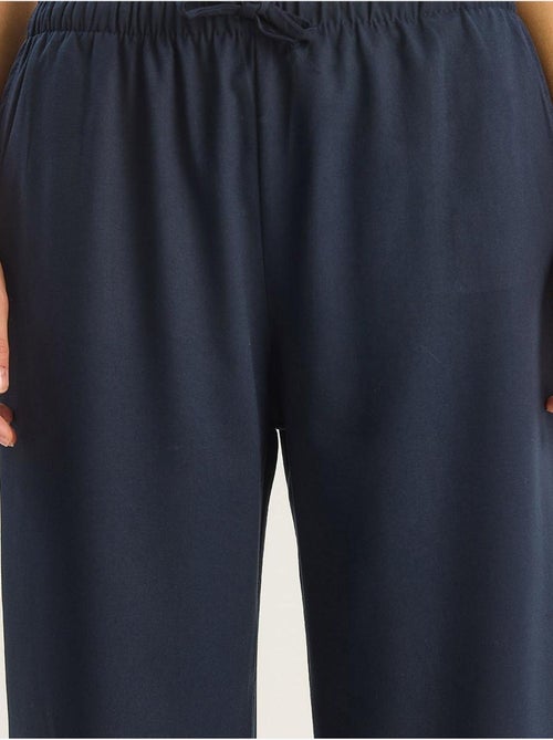 Pantalones palazzo de pierna ancha con cierre de lazo lucci - Kiabi Pantalones palazzo de pierna ancha con cierre de lazo lucci - Kiabi