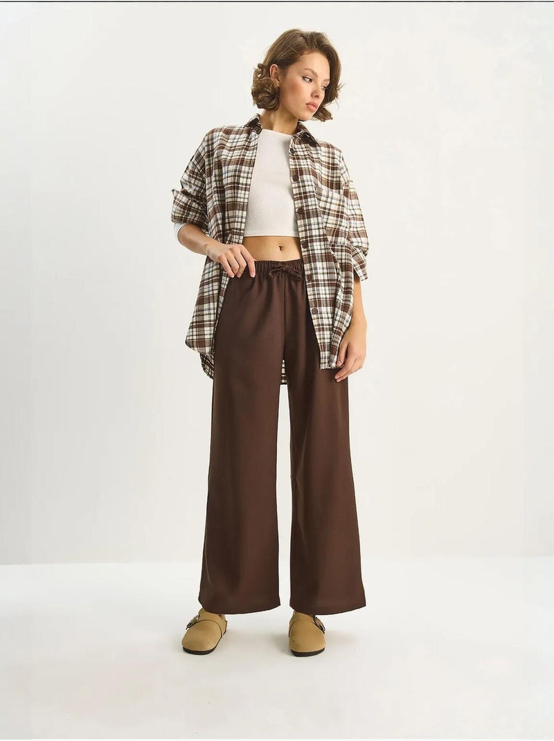 Pantalones palazzo de pierna ancha con cierre de lazo lucci Marrón oscuro - Kiabi